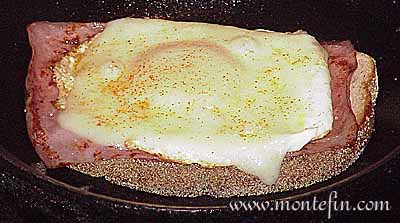 montefin's Strammer Max - Germany's delightful cheese, ham, egg, and rye bread open face sandwich.
