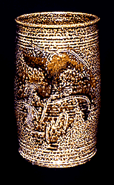Salt fire vase with sgraffito etched through rutile stain and sharkskin engobe