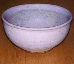 Wheel thrown stoneware kitchen bowl with a subtle blush glaze.